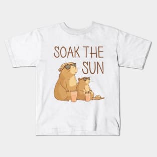 Sunbathing capybaras soak the sun Kids T-Shirt